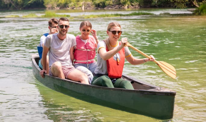 A group of young people enjoying kayaking