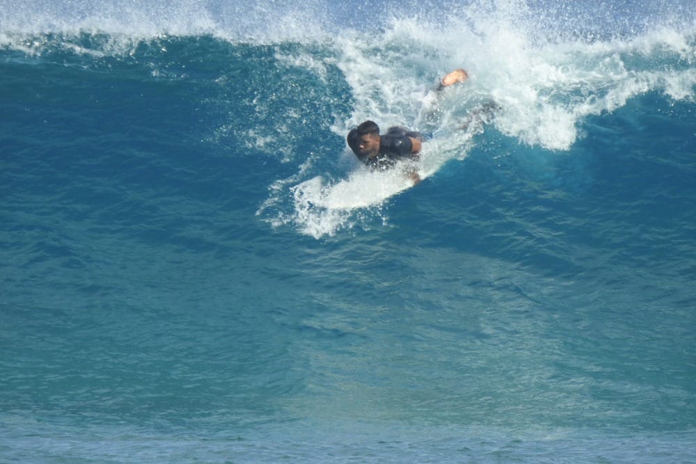 A man enjoying surfing